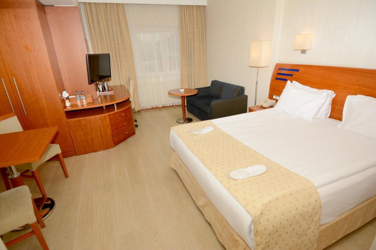 Holiday Inn Istanbul City By Ihg Exterior foto A room at the Dan Hotel